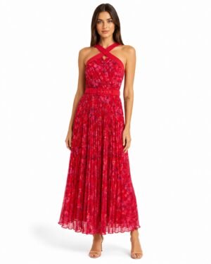 Phase Eight Zoya pleat floral midi dress φορεμένο σε μοντέλο από μπροστά με halter λαιμόκοψη, ζώνη και πλισέ φούστα