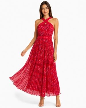 Phase Eight Zoya pleat floral midi dress σε styled φωτογράφιση με κίνηση που αναδεικνύει την πλισέ φούστα