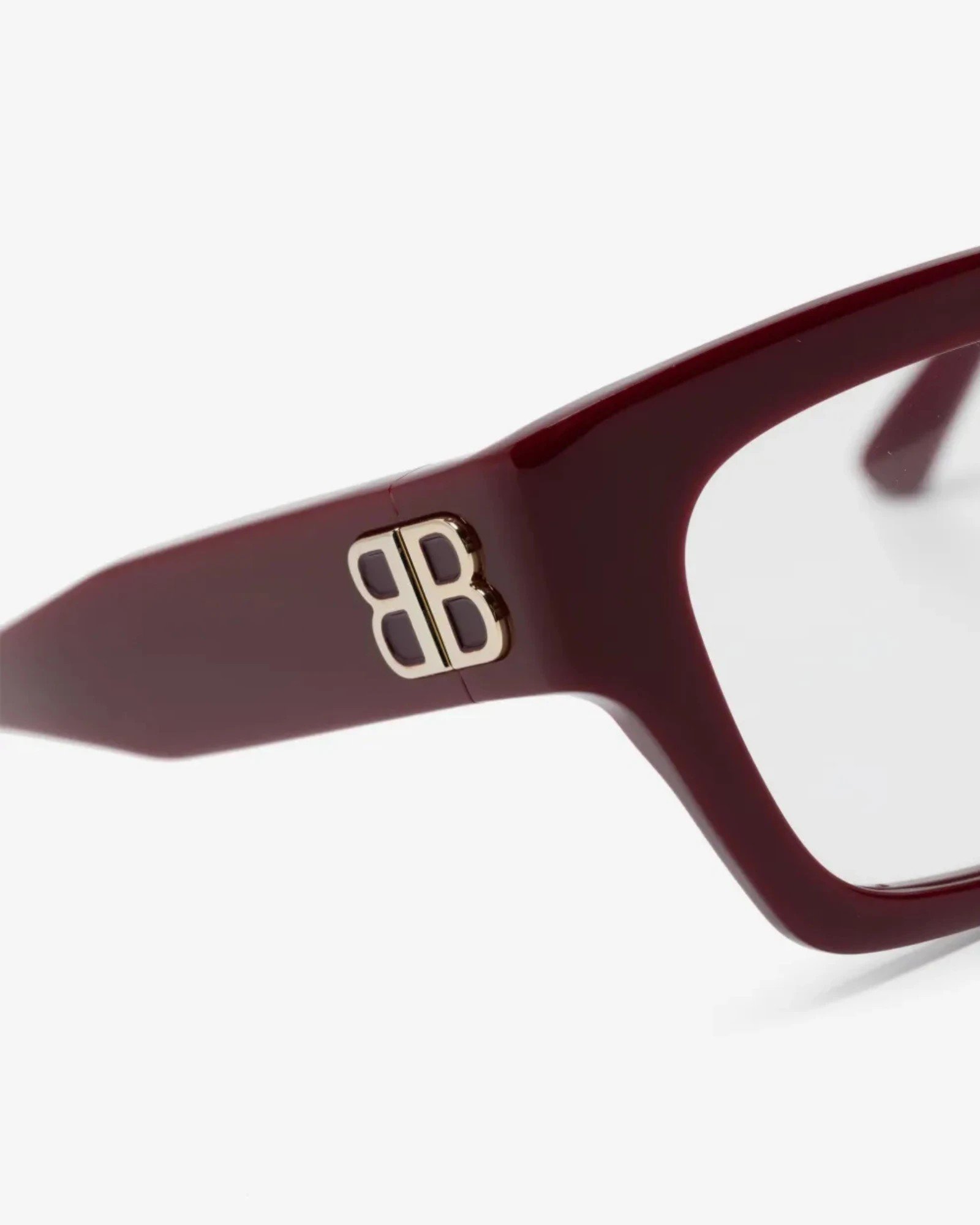 Λεπτομέρεια BB logo σε Balenciaga BB0274O 003 μπορντό σκελετό