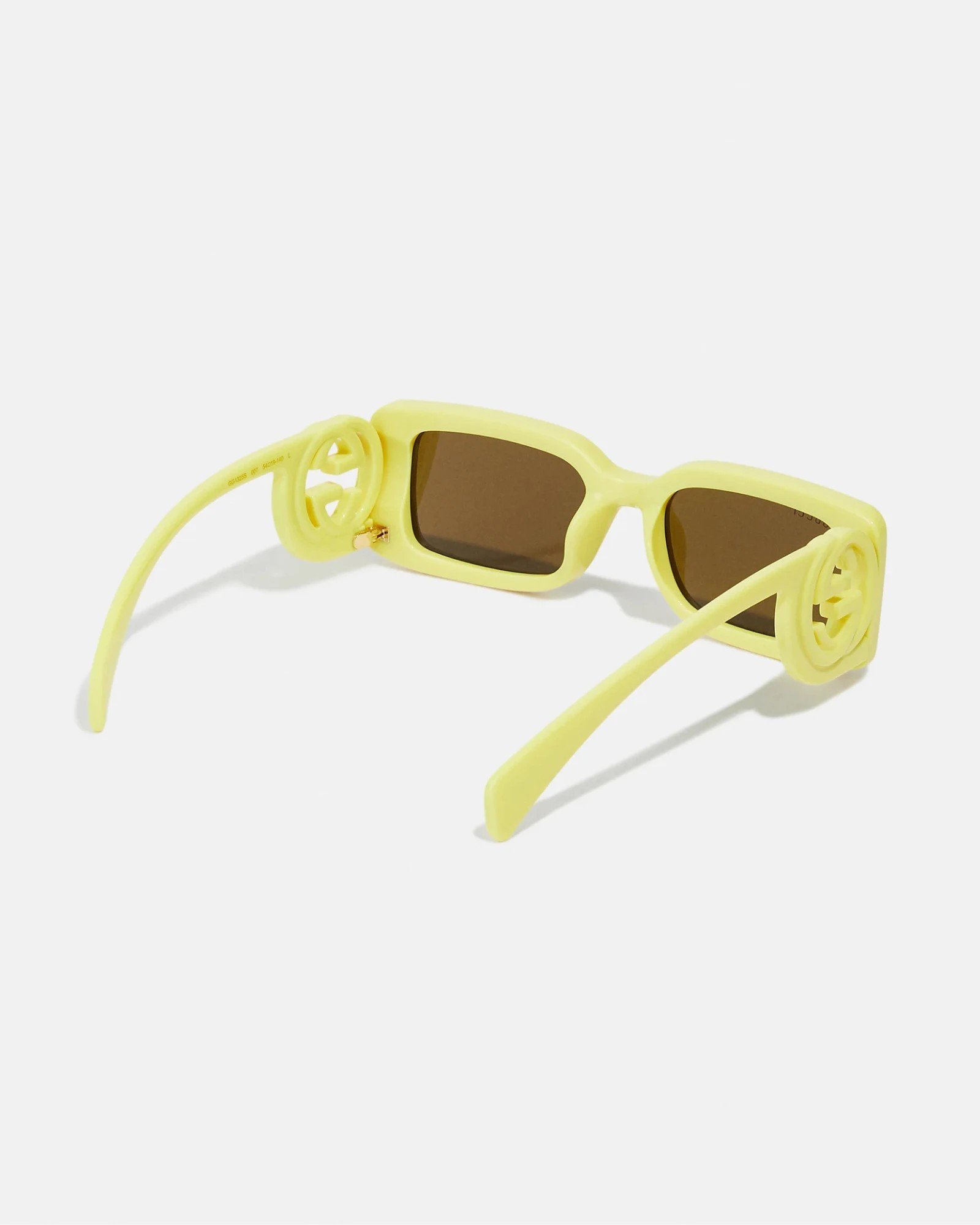 Πίσω όψη των κίτρινων γυαλιών ηλίου Gucci GG1325S 007 με καφέ φακούς