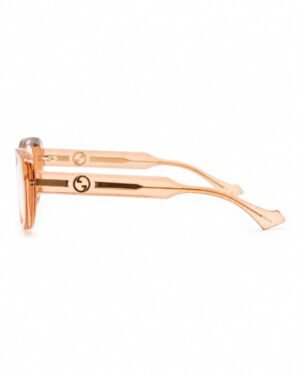 Gucci GG1559OK 003 γυαλιά οράσεως σε διαφανή ροδακινί απόχρωση πλαϊνή όψη